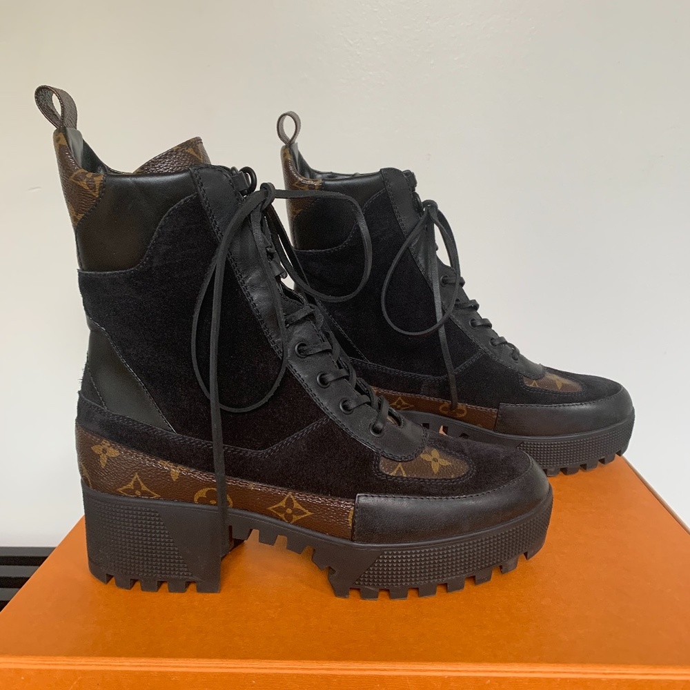 Louis Vuitton Laureate boots.